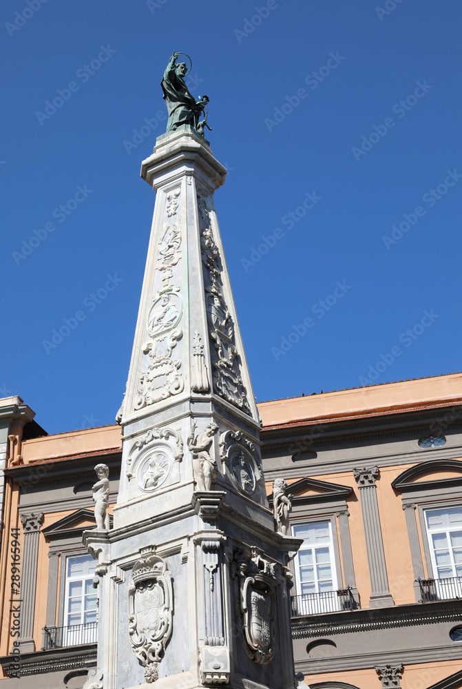 Obelisk with satue of Saint Dominic in Naples