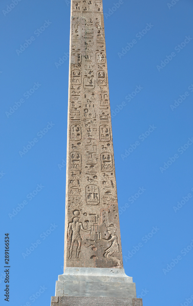 Old Egyptian Obelisk with hieroglyphs