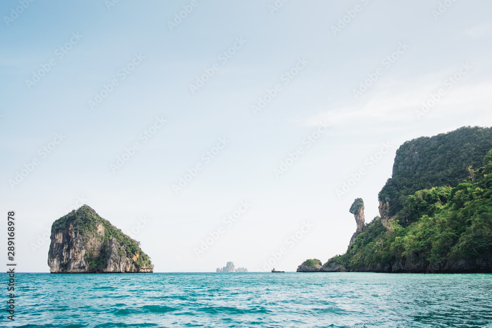 Jungle islands and turquoise waters in the Andaman Sea off Krabi Thailand