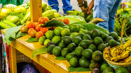 View on avocado and fruits on market in Salento, Colombia
