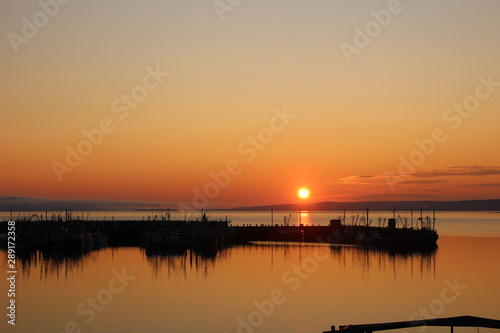 Sunset over fisher boats