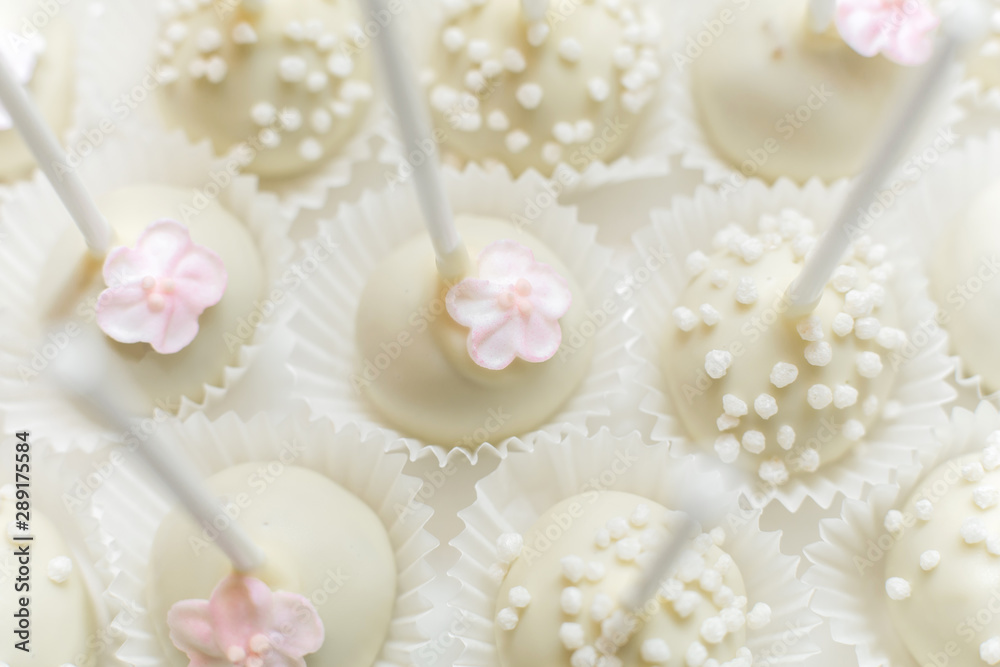 Close-up of pop cake or sticky cakes. Stylish pastries as a decoration for the holidays. Sweet bar Close-up of pop cake or sticky cakes. Stylish pastries as a decoration for the holidays. Sweet bar