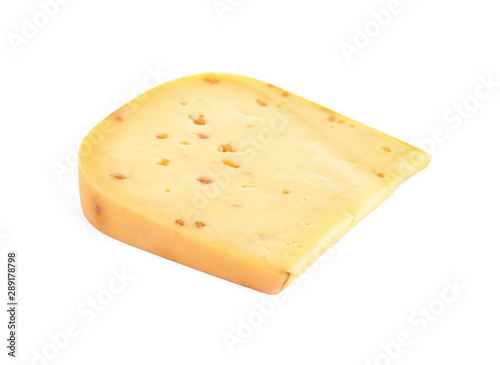 Piece of tasty cheese with fenugreek isolated on white