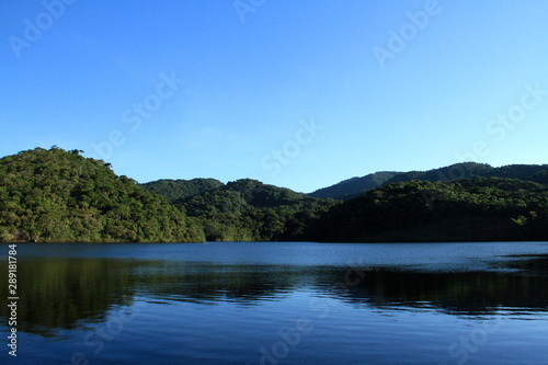 Fototapeta Naklejka Na Ścianę i Meble -  Forest e Lagoon photographed in the city of Cariacica, Espirito Santo. Southeast of Brazil. Atlantic Forest Biome. Picture made in 2012.