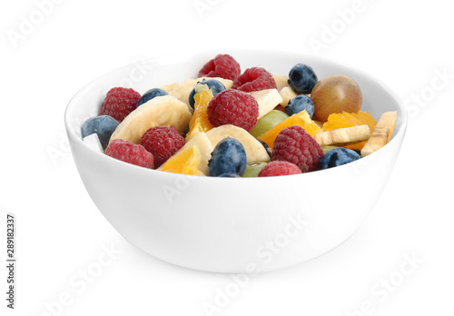 Fresh tasty fruit salad on white background