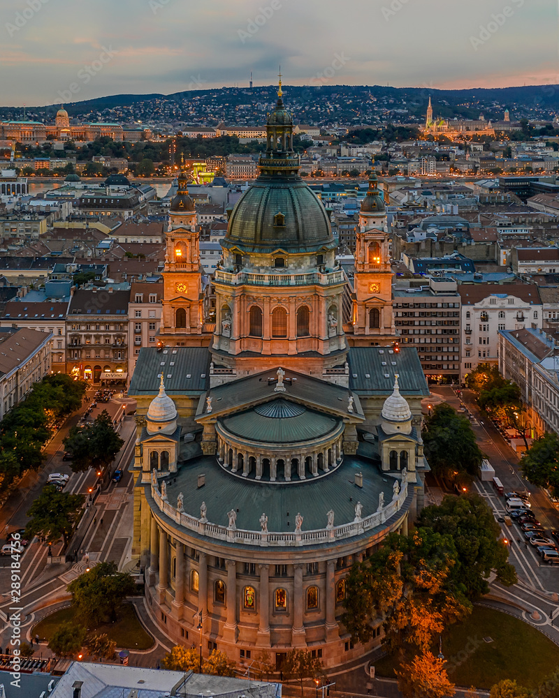 St Stephen Basilica in sunset. Amazing city lights. Cloudly sky an aerial view