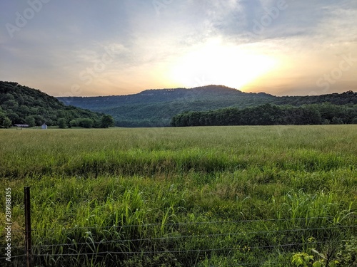 sunset in the mountains over the Ozarks © Lark