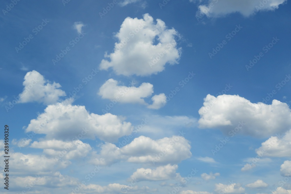 Blue sky with beautiful fluffy clouds, natural background Blue sky with beautiful fluffy clouds, natural background