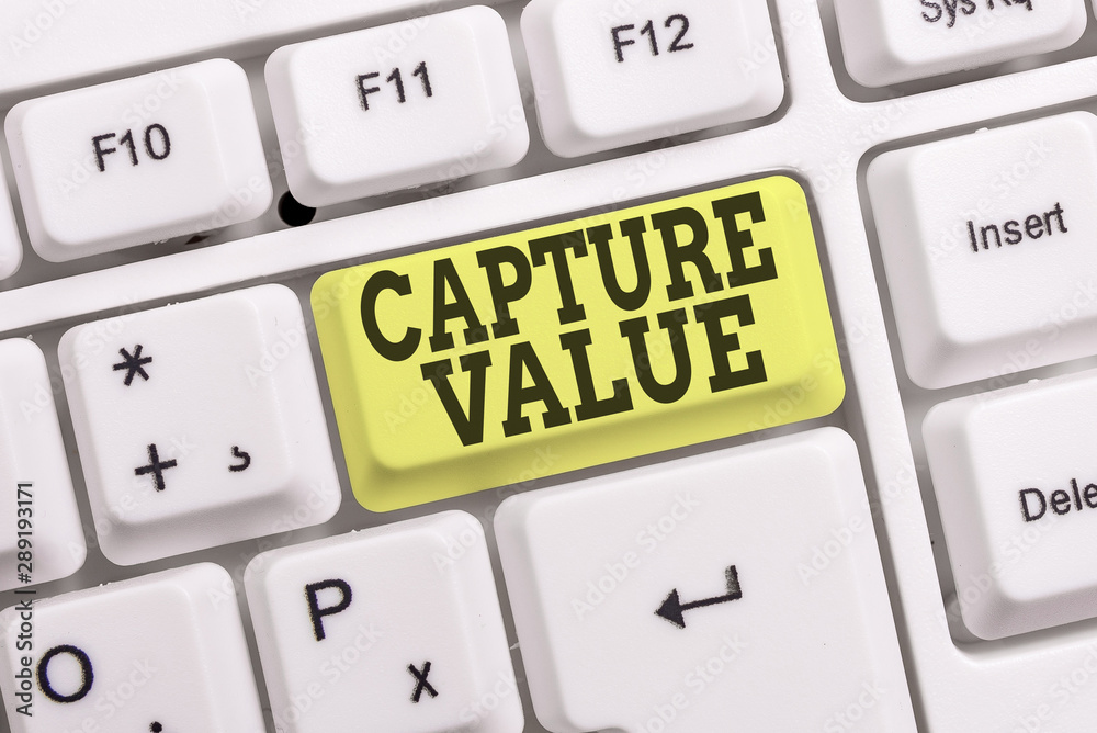Conceptual hand writing showing Capture Value. Concept meaning Customer Relationship Satisfy Needs Brand Strength Retention White pc keyboard with note paper above the white background Conceptual hand writing showing Capture Value. Concept meaning Customer Relationship Satisfy Needs Brand Strength Retention White pc keyboard with note paper above the white background