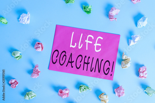 Writing note showing Life Coaching. Business concept for demonstrating employed to help showing attain their goals in career Colored crumpled rectangle shaped reminder paper light blue background © Artur