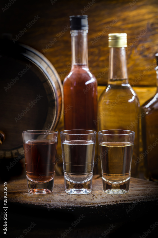 Bottle of Cachaça, drips, cane or sugar cane is the name given to brandy produced in Brazil. Bottle of typical Brazilian drink for export. Vintage drink still Bottle of Cachaça, drips, cane or sugar cane is the name given to brandy produced in Brazil. Bottle of typical Brazilian drink for export. Vintage drink still