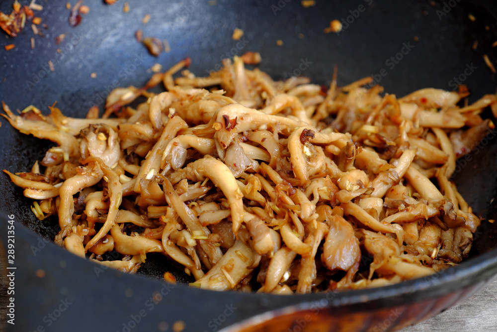 vegan food, abalone mushroom fry with lemongrass chopped, soy sauce for vegetarian meal vegan food, abalone mushroom fry with lemongrass chopped, soy sauce for vegetarian meal