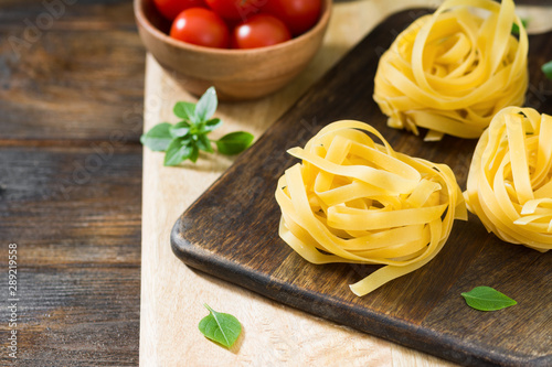 Pasta on a wooden Board. Pasta nests