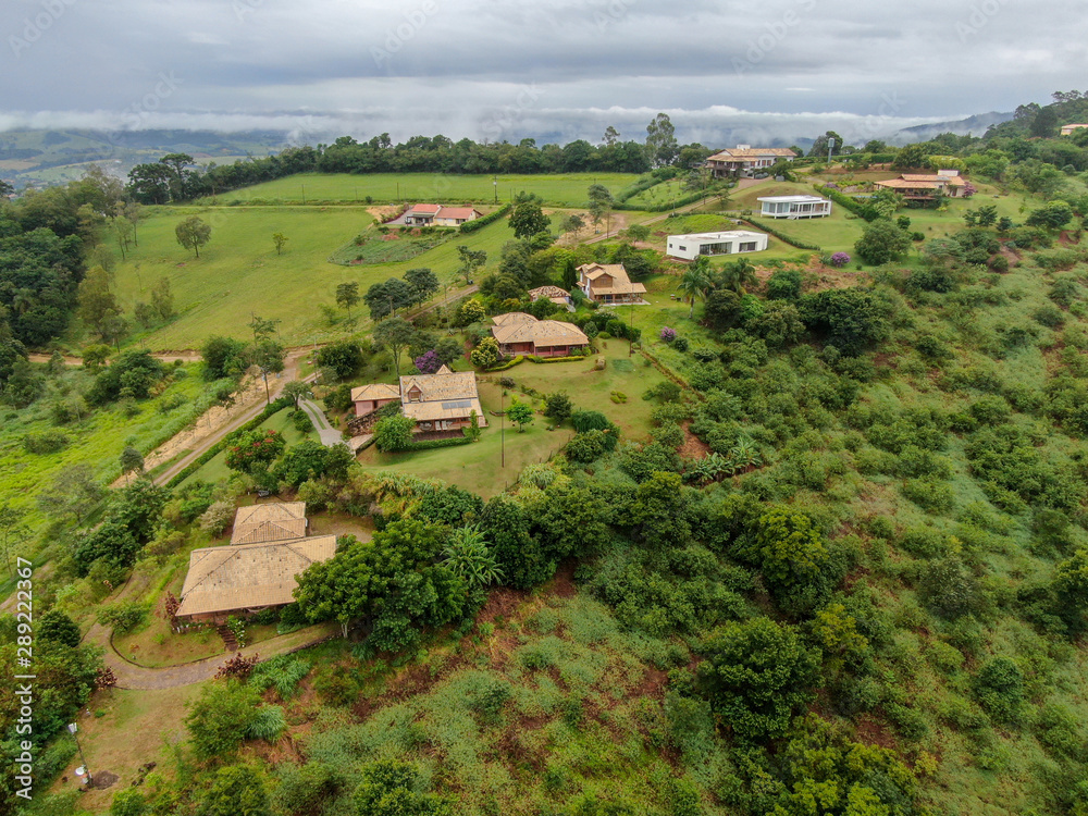 Naklejka premium Aerial view of luxury villa in tropical valley, Brazil