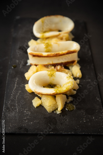 Spanish squid top with potatoes