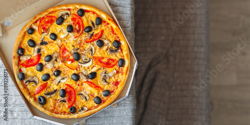 pizza, mushrooms, olives, tomato sauce, cheese, (ingredients). hot pizza. Top view. copy space