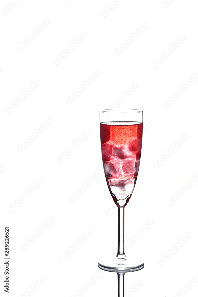 Glass of red champagne with ice on white background Glass of red champagne with ice on white background