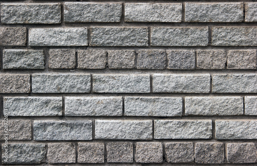 Brick wall texture. Gray bricks background.