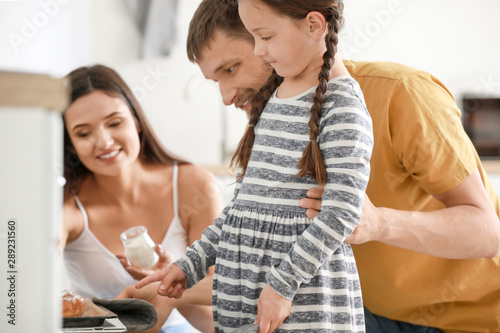 Young family with freshly b...