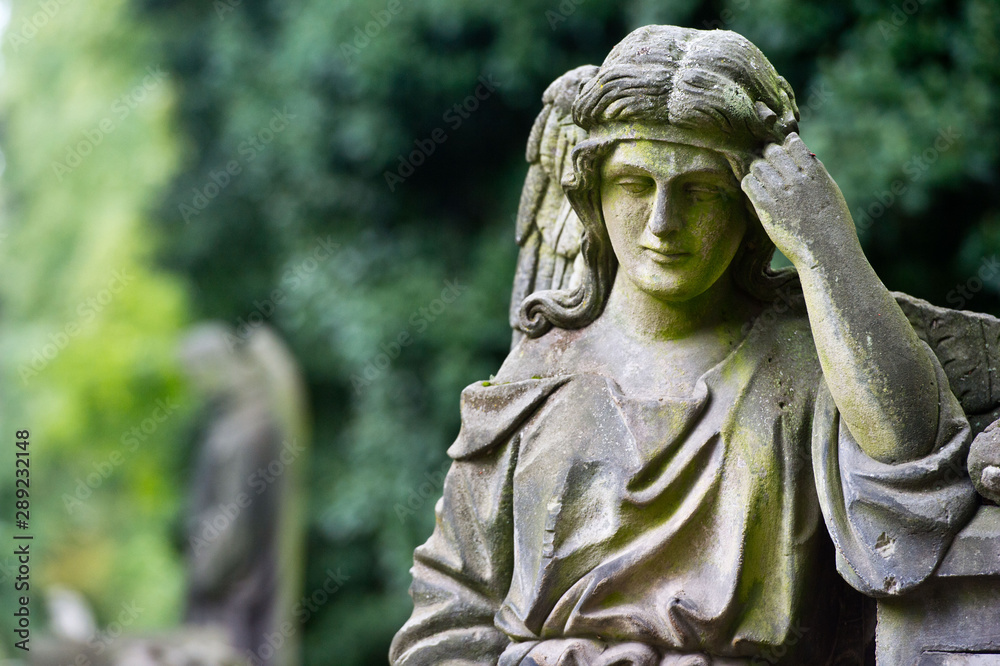 Sculpture of Angel at a Prague cemetery. Czech Republic. Sculpture elements. Sculpture of Angel at a Prague cemetery. Czech Republic. Sculpture elements.