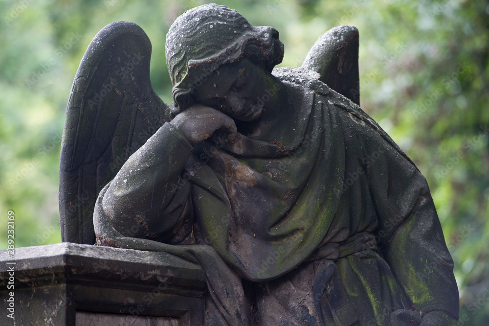 Sculpture of Angel at a Prague cemetery. Czech Republic. Sculpture elements. Sculpture of Angel at a Prague cemetery. Czech Republic. Sculpture elements.