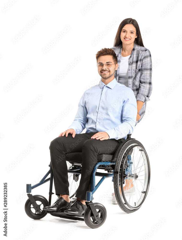 Young businessman in wheelchair and with wife on white background Young businessman in wheelchair and with wife on white background