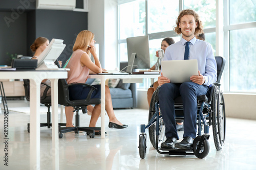 Handicapped young man worki...