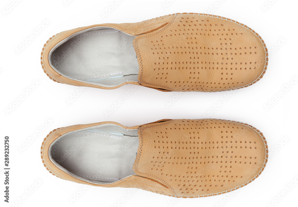 Classic male leather shoes isolated on a white, top view. Classic male leather shoes isolated on a white, top view.