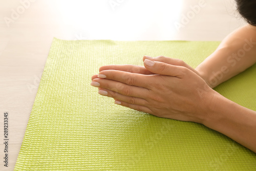 Woman's hands in prayer pos...