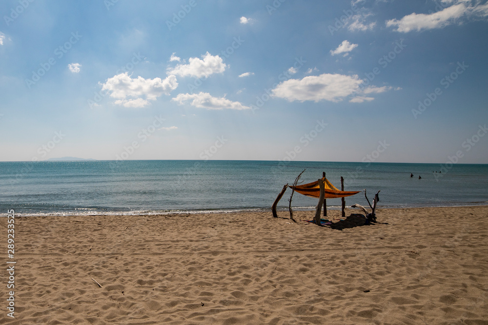 Beach tent in Marina di Alberese beach, Tuscany, Italy. Beach tent in Marina di Alberese beach, Tuscany, Italy.