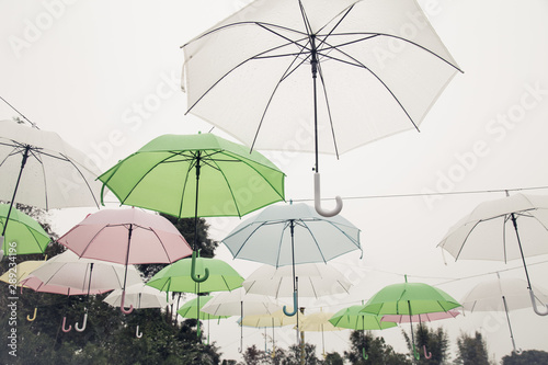 Colorful umbrellas background. Colorful umbrellas in the sky