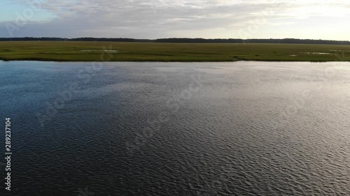 Aerial view, crossing Intracoastal Water way towards estuary vicinity of Edisto, South Carolina photo