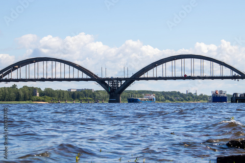 Fototapeta Naklejka Na Ścianę i Meble -  reinforced concrete arched road bridge over the Volga river in Rybinsk.