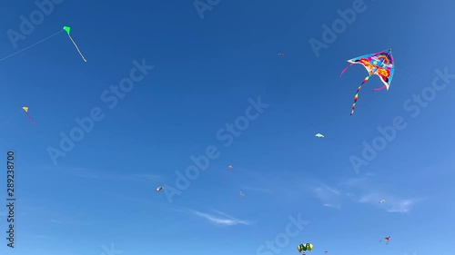 Beautiful bright kite against the blue sky in the park of the 300th anniversary of St. Petersburg. photo