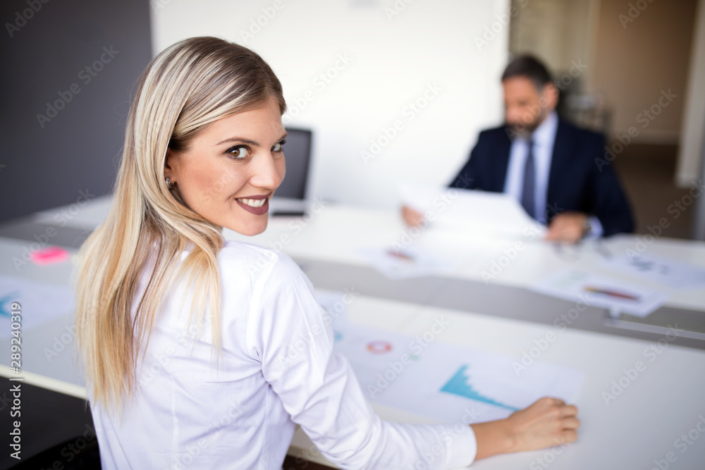 Creative business people working on business project in office Creative business people working on business project in office