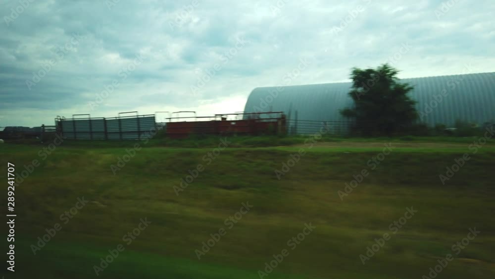 Slow-motion of land in North Dakota with houses. Slow-motion of land in North Dakota with houses.