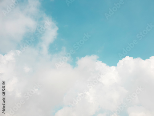 cloud floating in blue sky with copy space.Water droplets and ice crystals gathered together into clumps. Floating in the azure atmosphere © Nalin