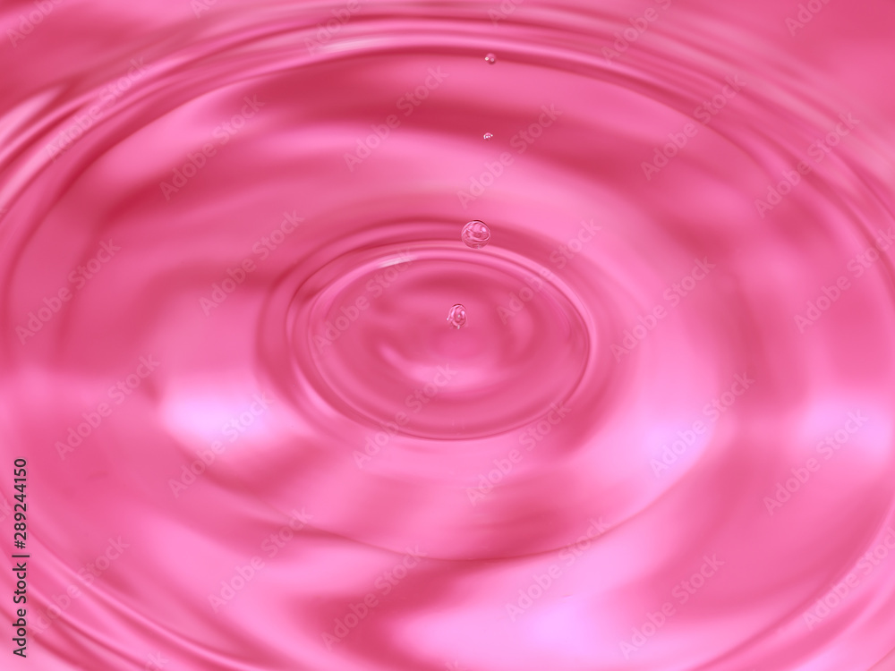 close up of a water drop falling and impact with a body of water close up of a water drop falling and impact with a body of water