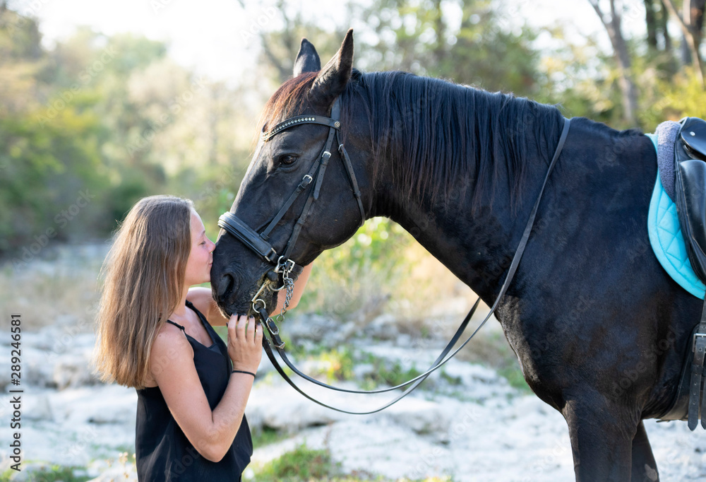 Obraz premium riding girl and horse