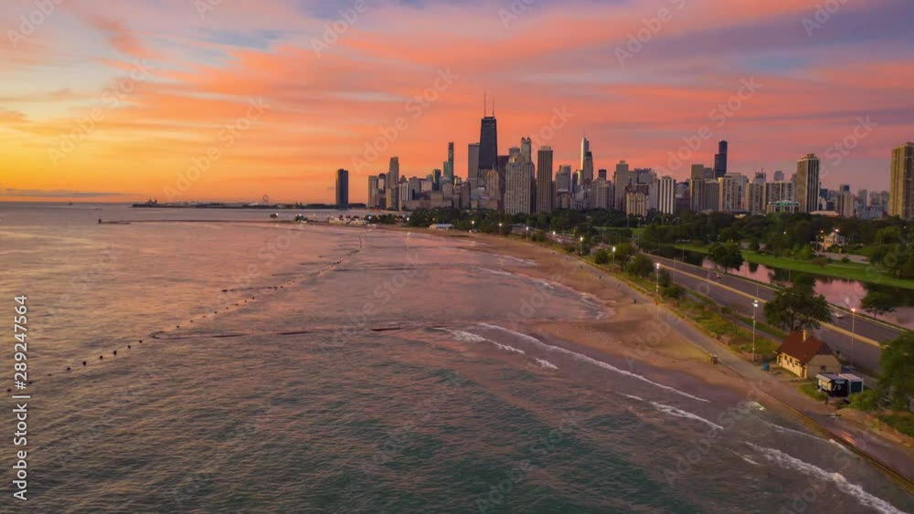Aerial timelapse of a summer sunrise along the Lakeshore Path in Chicago, Illinois Aerial timelapse of a summer sunrise along the Lakeshore Path in Chicago, Illinois