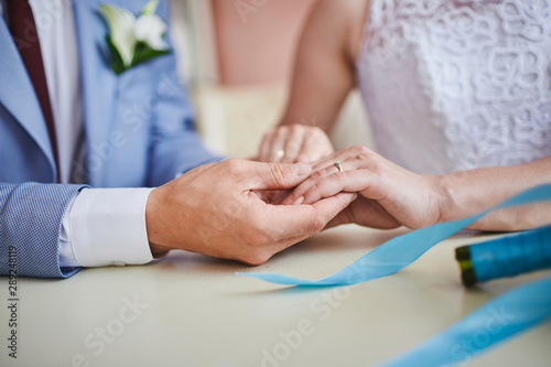 man and woman holding hands