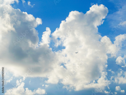 Blue sky and white clouds background.