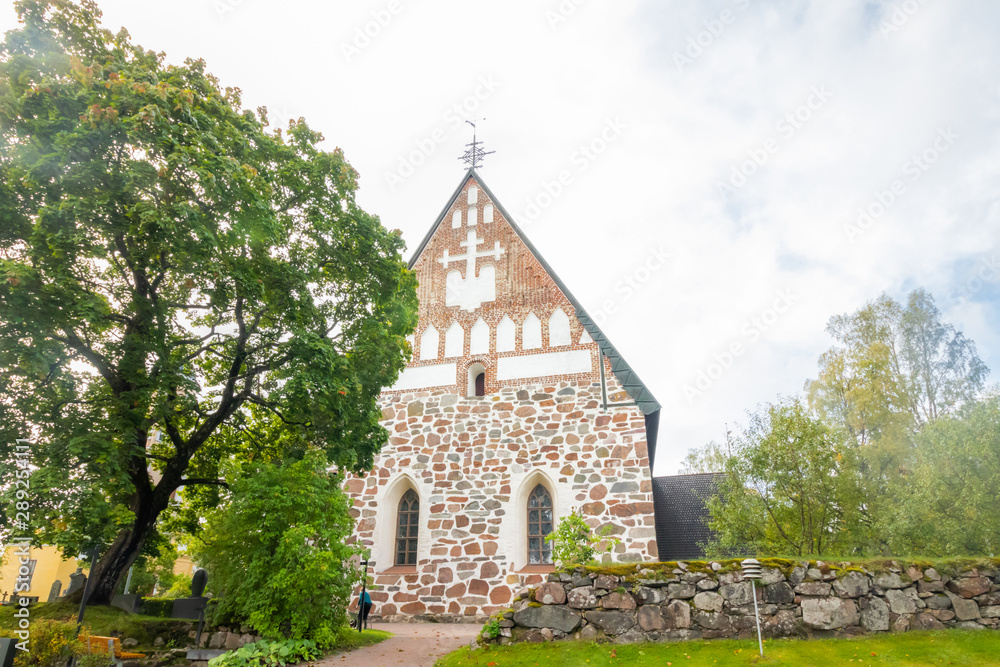 Naklejka premium Hollola, Finland - 9 September 2019: Old medieval stone church of St. Mary in Hollola, Finland