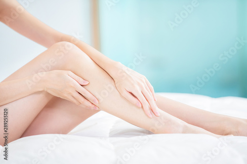 Beauty woman touch her leg