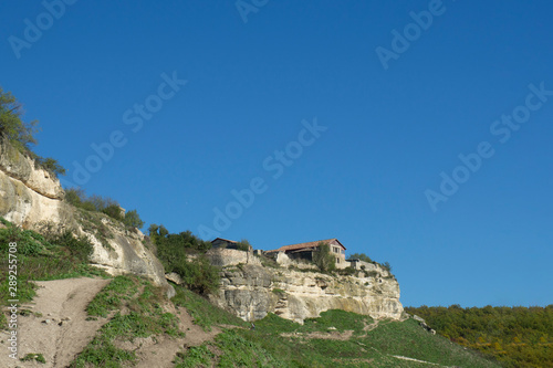 View of the house of Firkovich. Bakhchisaray. Cave city of Chufut-Kale. Republic of Crimea.