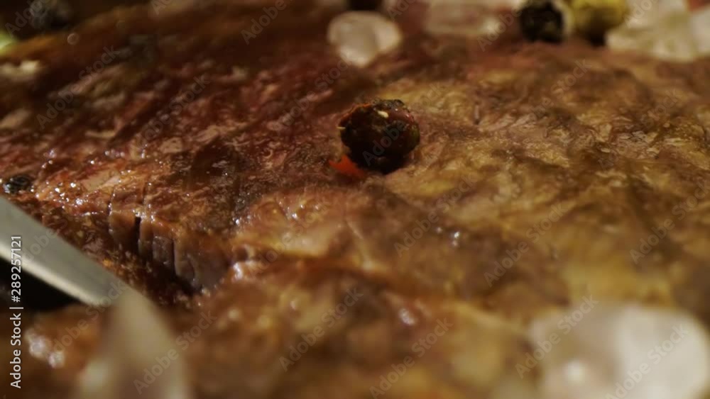 Tasty food, steak cut with knife on plate in luxury restaurant. super close-up Tasty food, steak cut with knife on plate in luxury restaurant. super close-up