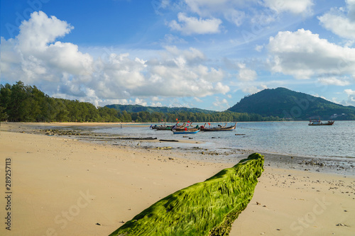 Beautiful sea with long tail boats in southern Phuket.
