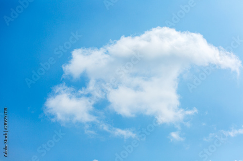 Beautiful and thick clouds in the blue sky. Cloudy sky on a clear day