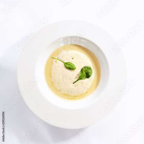 Cream soup with boletus forest mushrooms top view