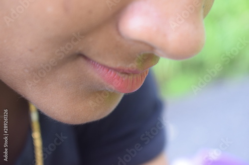 Beautiful  pink lips,  Perfect natural lips of young woman,Close Up Of Smiling.
